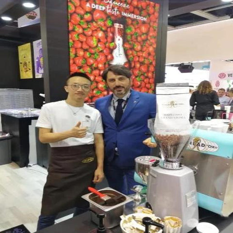 One Miscela D'Oro Branded Brown Apron